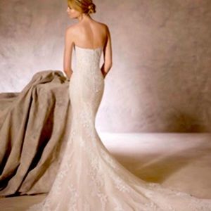 La Sposa pure lace wedding dress .